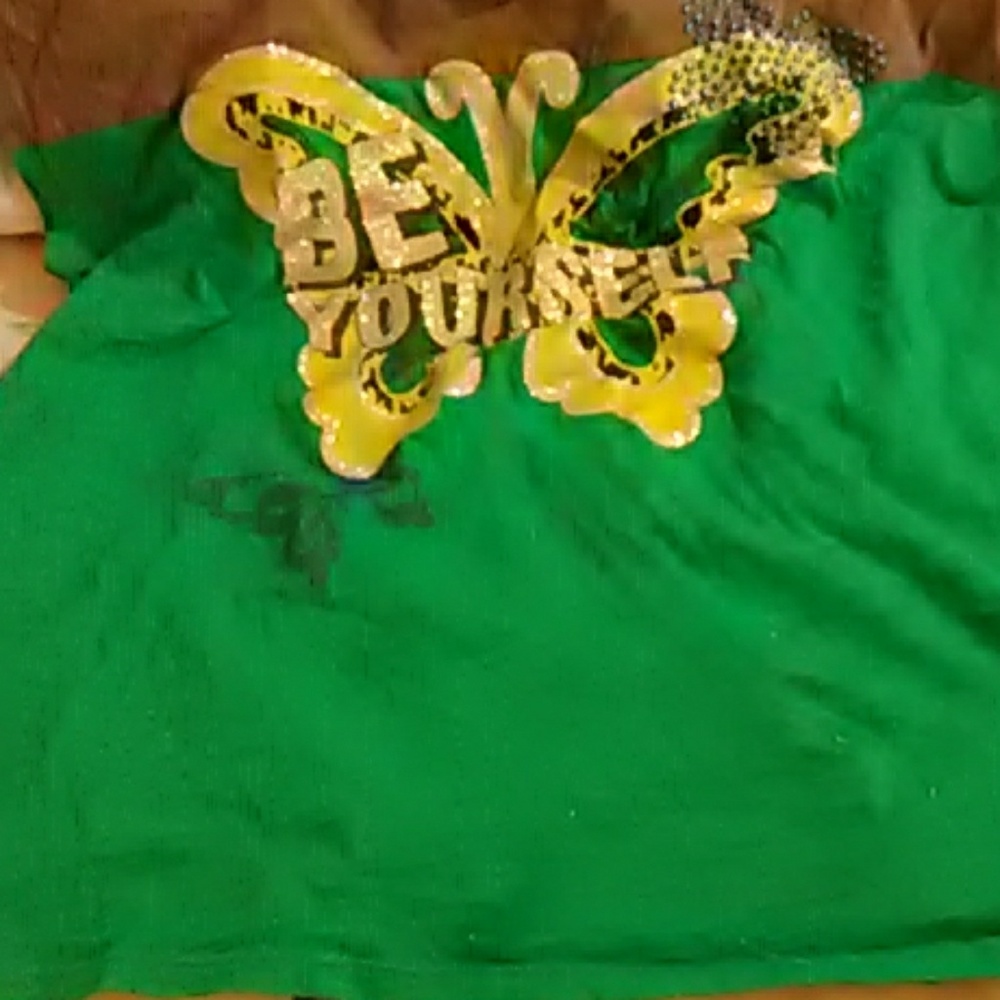 A green and gray teeshirt